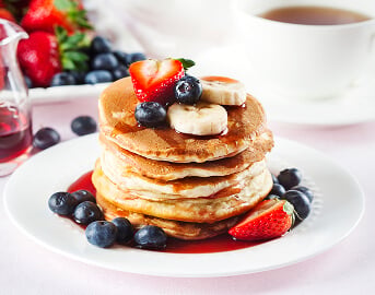 Breakfast Meal With Pancakes and Fresh Fruit in Assisted Living Facility Breakfast Meal With Pancakes and Fresh Fruit in Assisted Living Facility