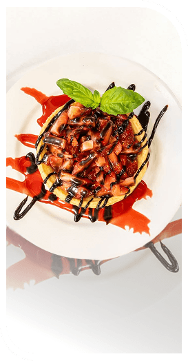 Gourmet Bruschetta Plated With Basil and Balsamic Drizzle at an Independent Living Facility