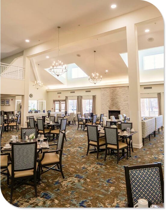 Upscale Dining Room with Cathedral Ceilings and Chandeliers at an Independent Living Community Upscale Dining Room with Cathedral Ceilings and Chandeliers at an Independent Living Community