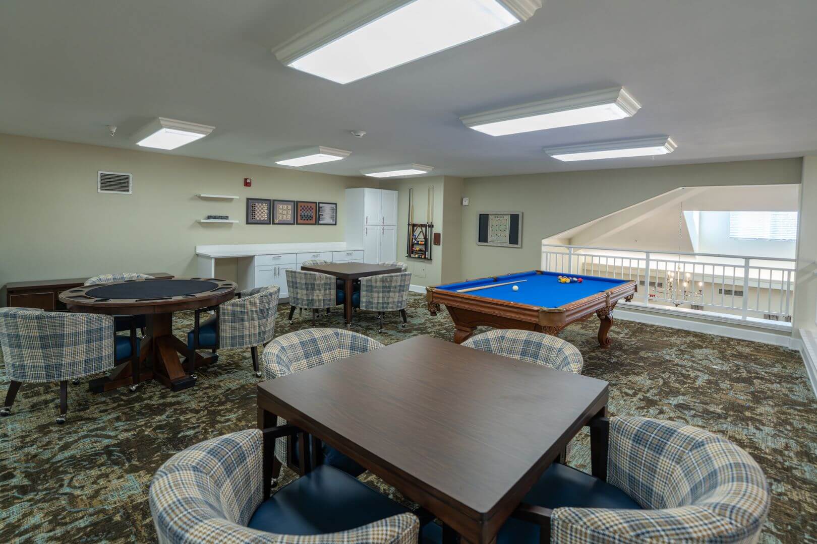 Game Room with Pool Table and Card Tables at an Independent Living Community